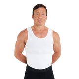 Man wearing a white compression shapewear mens tank top and black pants on a white background